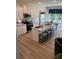 Well-lit kitchen features a large island with barstool seating and modern appliances at 1567 Aiden Way # 34, Conyers, GA 30013