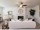 Inviting living room with a cozy fireplace, elegant decor, and ample seating for relaxation and gatherings at 1567 Aiden Way # 34, Conyers, GA 30013