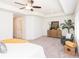 A view of the main bedroom with a sitting area, lots of natural light and tray ceilings at 1567 Aiden Way # 34, Conyers, GA 30013