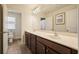 Bathroom with a double sink vanity and granite countertops at 526 Lost Creek Dr, Woodstock, GA 30188