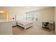 Bright bedroom with natural light, pink accents, and white furnishings at 526 Lost Creek Dr, Woodstock, GA 30188