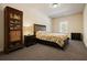 Cozy bedroom with plush carpeting and a large window offers a restful retreat at 526 Lost Creek Dr, Woodstock, GA 30188