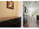 Stylish kitchen featuring dark wood cabinets, granite countertops, and stainless steel appliances at 526 Lost Creek Dr, Woodstock, GA 30188