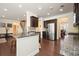 Bright kitchen with a stainless steel refrigerator and adjacent dining area at 526 Lost Creek Dr, Woodstock, GA 30188