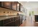 Modern kitchen with stainless steel appliances and granite countertops at 526 Lost Creek Dr, Woodstock, GA 30188