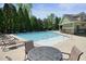 Relaxing community pool area features plenty of seating and a large pool for exercise or leisure at 526 Lost Creek Dr, Woodstock, GA 30188