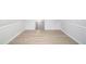 Finished basement with light gray walls, modern flooring, and clean white trim at 560 Austin Dr, Mcdonough, GA 30252