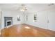 Bright living room with hardwood floors, fireplace, and lots of natural light at 560 Austin Dr, Mcdonough, GA 30252