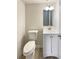 Neat bathroom with tile flooring, modern fixtures, and a new vanity at 5790 Ivywood Dr, Lithonia, GA 30038