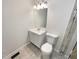 Modern bathroom featuring a new vanity, updated fixtures, and a neutral color palette at 5790 Ivywood Dr, Lithonia, GA 30038