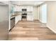 This modern kitchen has stainless steel appliances, a breakfast bar, and a large pantry at 5790 Ivywood Dr, Lithonia, GA 30038
