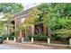 Charming red brick building with manicured landscaping and multiple entryways at 741 Frederica Ne St # 8, Atlanta, GA 30306