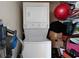 Stackable washer and dryer are featured inside of laundry room space at 741 Frederica Ne St # 8, Atlanta, GA 30306