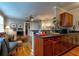 Cozy living room adjacent to the kitchen features hardwood floors and comfortable seating at 741 Frederica Ne St # 8, Atlanta, GA 30306