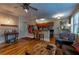 Bright living room with hardwood floors flowing into an adjacent kitchen area at 741 Frederica Ne St # 8, Atlanta, GA 30306