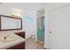 Bathroom with large vanity, toilet and tub with shower curtain at 873 United Se Ave, Atlanta, GA 30312
