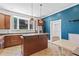 Beautiful kitchen featuring stainless appliances, a kitchen island, and charming breakfast nook at 873 United Se Ave, Atlanta, GA 30312