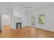 Bright living room featuring hardwood floors, fireplace, and lots of natural light at 873 United Se Ave, Atlanta, GA 30312