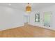 Inviting living room with hardwood floors, fresh paint, natural light, and a doorway leading to other rooms at 873 United Se Ave, Atlanta, GA 30312