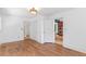Hardwood floors and bright white walls make this living room with two doorways feel welcoming at 873 United Se Ave, Atlanta, GA 30312