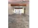 Unfinished basement with exposed beams, concrete floors, and natural light from window at the far end at 225 Austin Oaks Se Dr, Ellenwood, GA 30294