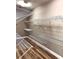 Walk-in closet with white wire shelving and wood-look flooring at 225 Austin Oaks Se Dr, Ellenwood, GA 30294