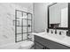 Bathroom with stylish marble tile in the shower and a sleek, modern vanity with great lighting at 2404 Northlake Ct, Atlanta, GA 30345