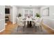 Stylish dining room featuring seating for eight, a rug and light neutral paint at 2404 Northlake Ct, Atlanta, GA 30345
