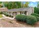 Quaint brick home showcasing meticulous landscaping and a welcoming walkway at 2404 Northlake Ct, Atlanta, GA 30345