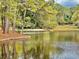 Enjoy relaxing near the lake, taking in the views of mature trees and tranquil water at 2404 Northlake Ct, Atlanta, GA 30345