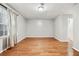 Open living area with hardwood floors, neutral walls, and abundant natural light at 2404 Northlake Ct, Atlanta, GA 30345