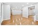 Expansive living room with hardwood floors and neutral paint and trim at 2404 Northlake Ct, Atlanta, GA 30345