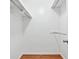 Spacious walk-in closet with rod and shelf storage for optimal organization at 2404 Northlake Ct, Atlanta, GA 30345