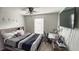 Comfortable bedroom with a gray upholstered headboard and an adjacent desk at 2144 Beacon Crest Dr, Buford, GA 30519