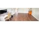Open area with a computer desk and hardwood floors; ideal for a home office at 2144 Beacon Crest Dr, Buford, GA 30519