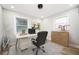 Cozy office featuring ample natural light, a comfortable chair, and organized workspace for productivity at 2198 Star Mist Sw Dr, Atlanta, GA 30311