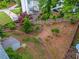 The backyard features a split-level setup, including a small deck and lush greenery near a privacy fence at 2325 Walnut Grove Way, Suwanee, GA 30024