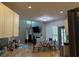 Open-concept living area featuring tile backsplash, stainless appliances, and eat in kitchen at 2325 Walnut Grove Way, Suwanee, GA 30024
