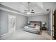 Spacious main bedroom showcasing the ensuite bathroom for added convenience at 2325 Walnut Grove Way, Suwanee, GA 30024