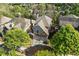 Lovely aerial view of a well-maintained home with mature trees at 3709 Baxley Ridge Dr, Suwanee, GA 30024