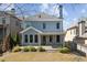 Beautiful backyard with a patio, landscaping and a grassy lawn at 3709 Baxley Ridge Dr, Suwanee, GA 30024