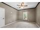 Bedroom with carpet, one window, and a ceiling fan at 3709 Baxley Ridge Dr, Suwanee, GA 30024