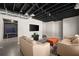 Finished basement featuring a flat-screen TV and a ping pong table for recreational activities at 7665 Golden Sands Dr, Cumming, GA 30041