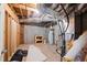 Basement utility area with exposed ductwork and equipment at 7665 Golden Sands Dr, Cumming, GA 30041