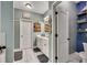 Charming bathroom with decorative coastal theme, dual sinks, and stylish accents at 12 Little Creek Manor Dr, Dallas, GA 30157