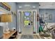 Entryway showcasing decor, unique lighting, and durable flooring at 12 Little Creek Manor Dr, Dallas, GA 30157