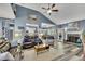 Open living room with a fireplace, comfortable seating, and views into the kitchen at 12 Little Creek Manor Dr, Dallas, GA 30157