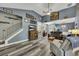 Open-concept living room with staircase, comfortable seating, and decor at 12 Little Creek Manor Dr, Dallas, GA 30157