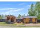 Charming outbuildings in the backyard, offering versatility and extra storage space at 12 Little Creek Manor Dr, Dallas, GA 30157