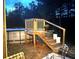 Backyard deck with an above-ground pool, offering a relaxing outdoor space for recreation at 142 Susie Creek Ln, Villa Rica, GA 30180